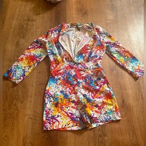 Woman’s colorful one piece jumper with front open ..